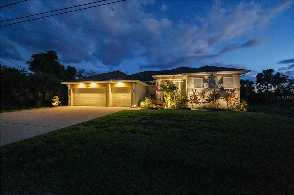 Photo of 15392 Aldama Circle, Port Charlotte, FL 33981 (MLS # D6148821)