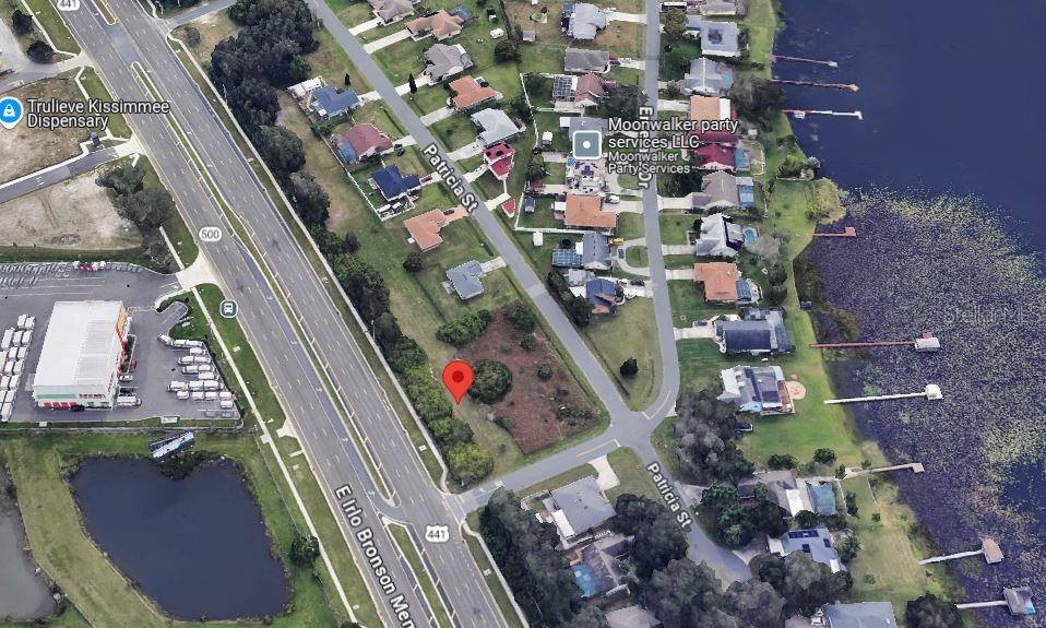 This parcel is a corner lot with 200 feet of US-192 frontage and 81.6 feet deep, this amazing lot is zoned residential medium density, you can build 8-18 units per acre, duplexes, triplex, townhouses, or single-family homes.