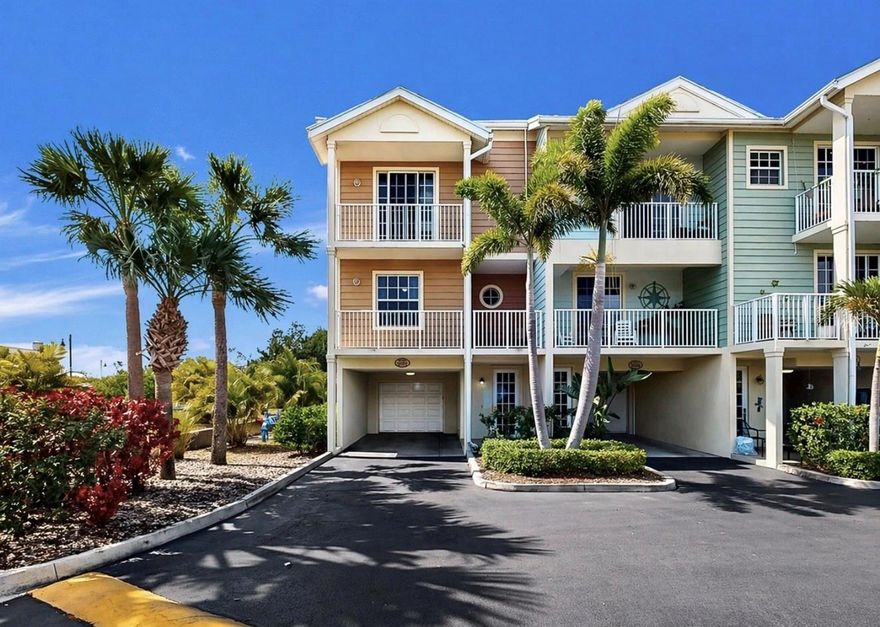 Welcome to 3202 Mangrove Point Drive, where investment opportunity meets effortless coastal living in the waterfront community of Little Harbor.

This RARE 4-bedroom END-unit townhome stands out from the rest, offering extra privacy, abundant natural light, and a flexible layout designed for both personal enjoyment and income potential. A main-level bedroom and full bath create the perfect setup for guests, while the upper level features three additional bedrooms, each with its own private balcony terrace, inviting in the coastal breeze and water views.

Offered fully furnished and completely turnkey, this property is already operating as a successful short-term rental - ready to generate income from day one. Thoughtfully equipped with everything guests love, including furniture, TVs, 8 bicycles, and two golf carts, it delivers a seamless experience for both owners and visitors. Whether you're targeting Airbnb revenue or looking for a personal escape, this home checks every box with low-maintenance ownership and high guest appeal.

Beyond your front door, the lifestyle truly comes to life. Residents and guests enjoy access to a private fishing pier, a white sandy beach, multiple waterfront dining options, resort-style pools, a marina with direct access to the Bay and Gulf (no bridges), and endless ways to stay active - from tennis and pickleball to kayaking along scenic waterways often visited by dolphins and manatees. Sunset views from the private pier, days spent on the water, and evenings at the tiki bar create a vacation-like atmosphere year-round.

Perfectly positioned for convenience, you're within easy reach of Tampa's vibrant dining, sports, and entertainment scene, while also being a short drive to world-renowned beaches like Siesta Key Beach, Anna Maria Island, and Fort De Soto Park.

Whether you're seeking a low-maintenance coastal retreat, a high-performing investment, or the best of both worlds, this waterfront townhome delivers a lifestyle, and return - that's hard to match.