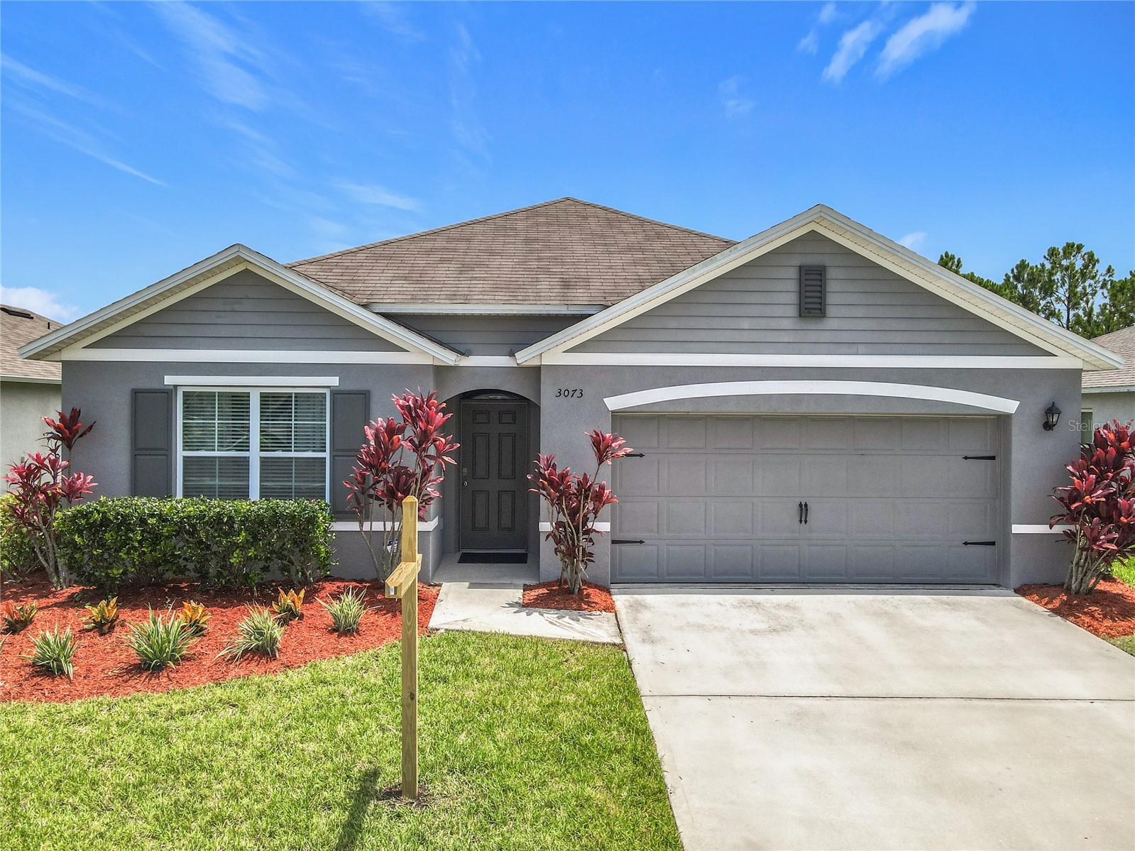LOCATION, LOCATION, LOCATION!
Don’t miss your chance to own this gem in a charming neighborhood just minutes from the beach and convenient access to the interstate. Located only 6 miles from the heart of New Smyrna Beach’s vibrant downtown, where shopping, dining, and coastal living await, this home truly puts you in the center of it all.
This very popular floor plan — the Cali — featuring a bright, open-concept design with 4 spacious bedrooms and 2 full baths. As you enter through the wide foyer, you’re greeted by thoughtfully placed bedrooms on each side before the space opens up into a large kitchen, dining, and living area—perfect for entertaining family and friends.
Enjoy indoor-outdoor living with a covered lanai overlooking the backyard, ideal for weekend BBQs or peaceful morning coffee. The oversized master suite offers a relaxing retreat with a large shower and double vanity.
This home comes move-in ready with all the extras, including a dishwasher, and is built for long-term savings with a 15 SEER energy-efficient A/C system, dual-pane Low-E windows, and a 10-year structural warranty.
City water and all the modern features you’re looking for—plus unbeatable value in a desirable area!
What are you waiting for, come see this beauty today!