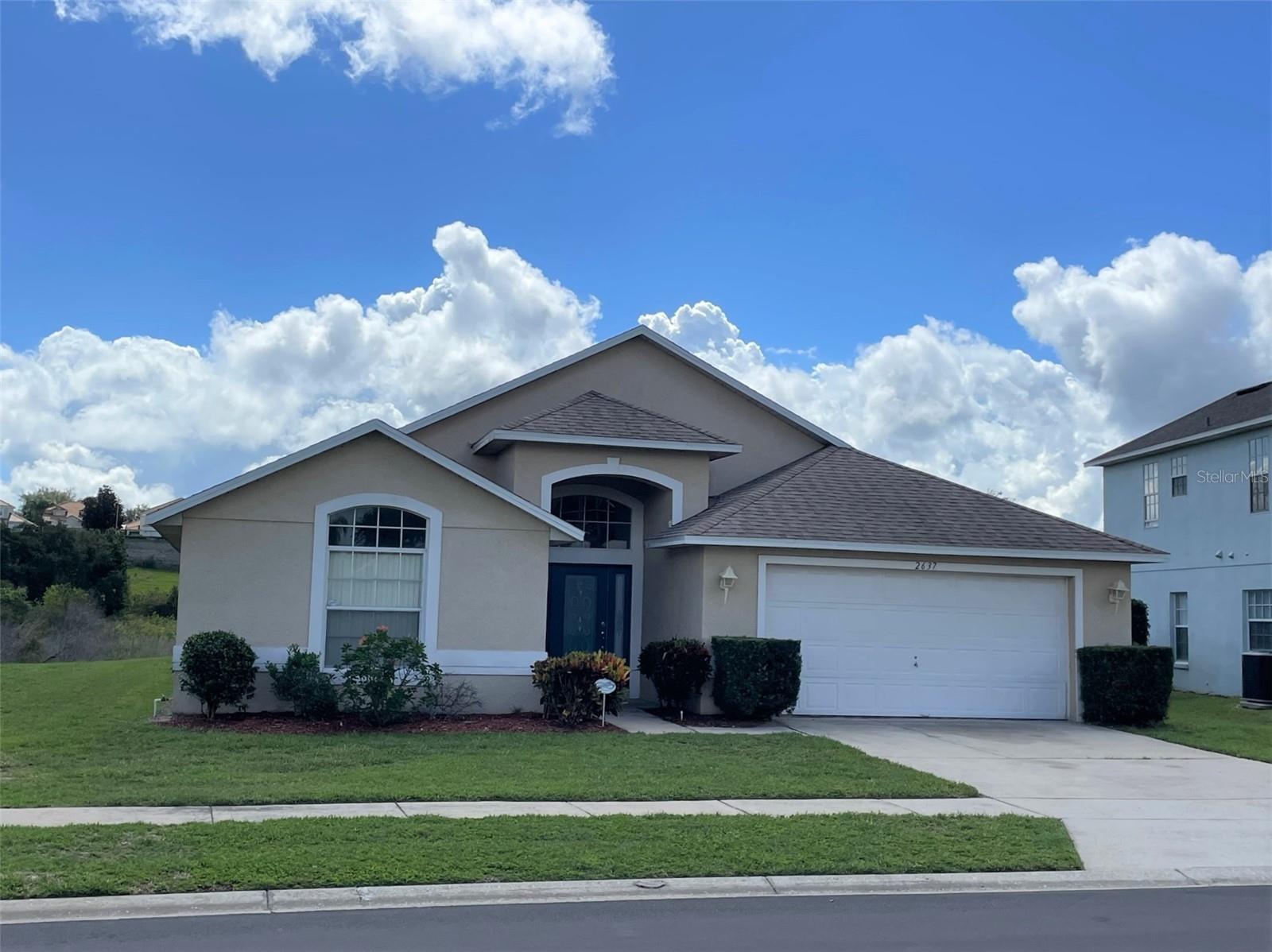 This is a fully furnished 4 bedroom pool home in a quiet sub-division. Rolling Hills has a low HOA fee and is in a prime location only 4 miles from Disney and close to the many shops and restaurants of west Hwy 192. Margaritaville and the H2O waterpark are also nearby while Sea World and Universal's parks are within a 30 minute drive. The pool and spa face south-east so the pool area gets the sun most of the day and it has a magnificent view over two ponds located to the rear of the property. There is an area of open space to one side of the property. The roof was replaced in 2018 and the home has been maintained by a local property manager. Inside you will find a well thought out spacious open floor plan with a comfortable lounge that enjoys views over the pond. There is also a separate dining area and a fully equipped kitchen that has a breakfast bar and second dining area. Accessed from the lounge area you will find a king master suite and en-suite bathroom with walk in closet. There are two further bedrooms located on the opposite side of the property and the second bathroom is adjacent to these bedrooms. The fourth bedroom is currently set up as an office. The garage is accessed through the laundry room. The property is zoned for short term rental if required and Rolling Hills is very popular with vacationing guests. Alternatively it can also be used as a primary residence should that be your preference.