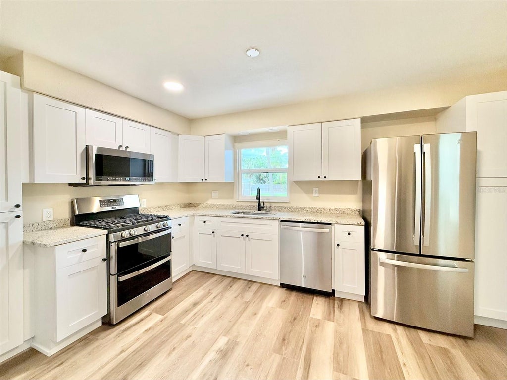 Photo of 1837 Pasadena Drive, Dunedin, FL 34698 (MLS # TB8539876)
