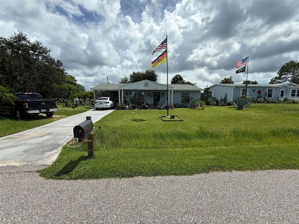 Photo of 12361 Prudential Avenue, Port Charlotte, FL 33981 (MLS # N6140765)