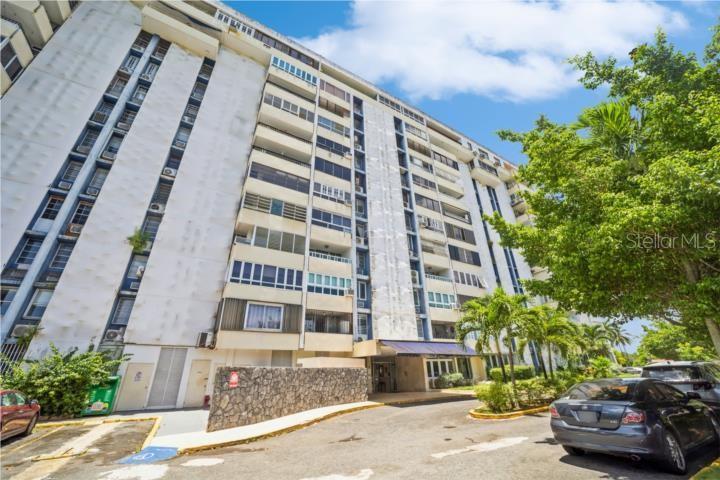 Listed at $225,000, this apartment in Condominio Laguna Gardens V (Bellamare) offers an ideal combination of space, comfort, and location. With 1,409 square feet of living area, the original four-bedroom layout was thoughtfully redesigned to expand the living room, creating a more open and inviting space perfect for entertaining or relaxing.
The unit benefits from both north and south exposure, allowing for excellent natural light and cross ventilation. It includes three bedrooms, two full bathrooms, hurricane-resistant windows, a laundry area, and a functional kitchen with an integrated dining area. One assigned parking space is also included.
Centrally located, the gated community of Laguna Gardens V features 24/7 security and amenities such as a pool, basketball and tennis courts, a playground, a backup generator, and a cistern for all common areas. Residents enjoy easy access to shopping centers, supermarkets, pharmacies, restaurants, and the Luis Munoz Marin International Airport. The HOA fee is $165 monthly, annual insurance is approximately $2,000, and property taxes are $1,093 bi-annual. Please note that the property does not meet FHA financing requirements. Proof of Funds and/or Pre-Approval Letter is required to schedule a private showing.