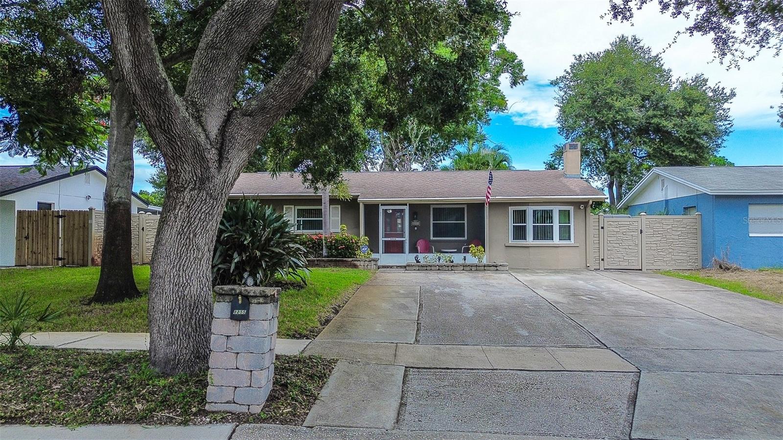 LOCATION, LOCATION, LOCATION!!!! High and dry during last summers storms and NO FLOOD INSURANCE REQUIRED. Well-maintained SEMINOLE 3BR/1BA block home with beautiful kitchen featuring honey wood cabinets, stone counters, and laundry off kitchen. Separate family room with stone fireplace, newer windows, and ample storage throughout. Screened front patio plus large screened back patio overlooking landscaped yard with 2 large storage sheds. Conveniently located just 8 minutes from Gulf beaches, 10 minutes to I-275 for easy Tampa access, and about 2 hours to Orlando.