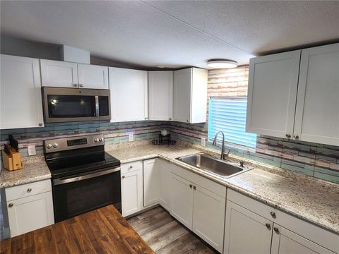 Tiny photo for 10915 NE 222nd Street, Fort Mccoy, FL 32134 (MLS # OM720034)