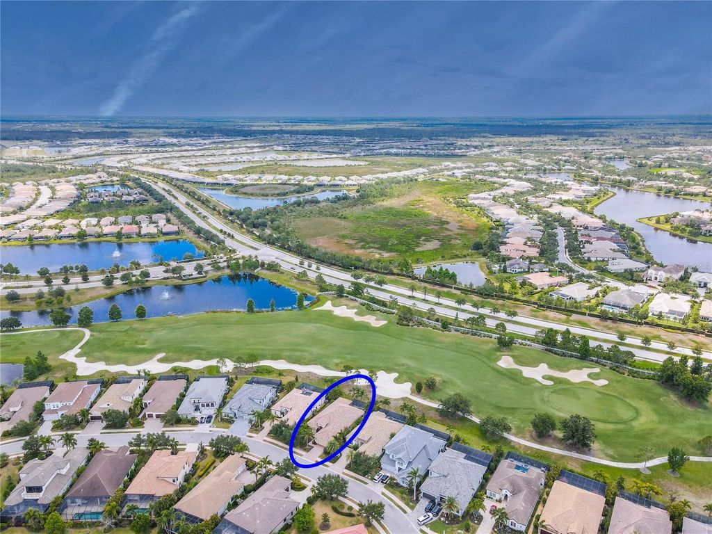 Photo of 7542 Windy Hill Cove, Bradenton, FL 34202 (MLS # A4655070)