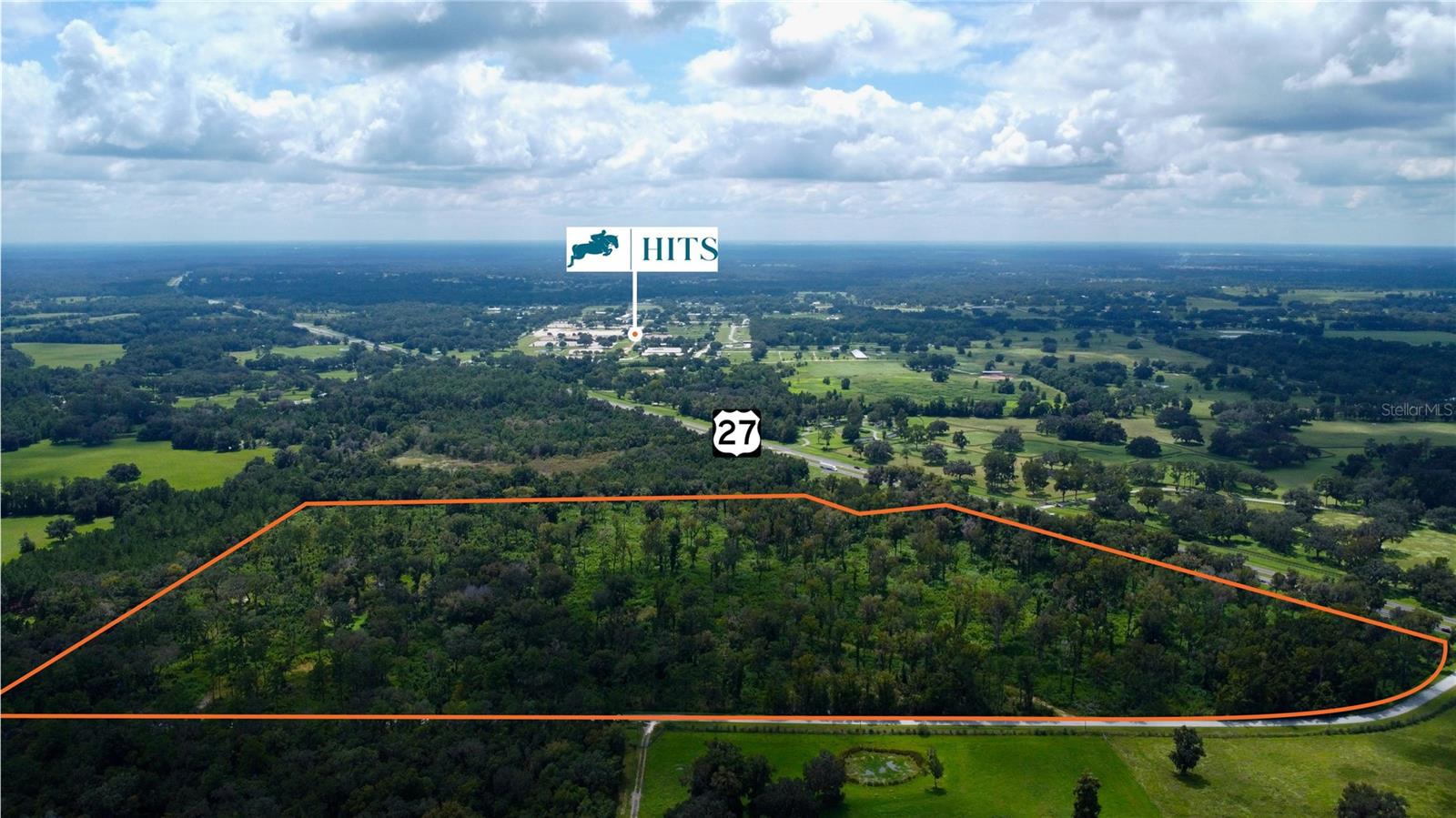 This 59.43 +/- acre parcel is located in the heart of Florida’s renowned horse country, just minutes from the HITS Winter Circuit and under 20 minutes from the World Equestrian Center. Situated at the corner of US Hwy 27 and NW 115th Street, north of Blitchton and close to Ocala, the property offers both seclusion and convenience hand in hand. Shopping is nearby, with Foxwood Publix only 15 minutes away and Tractor Supply just 11 minutes away. The land has been selectively cleared, maintaining a natural shaded canopy over much of the property. It also features a pond surrounded by mature oaks on the north side. With abundant wildlife and open acreage, the property is well suited for transformation into equestrian use!