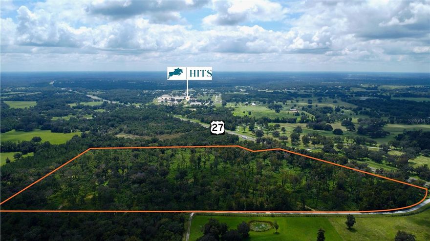 This 59.43 +/- acre parcel is located in the heart of Florida’s renowned horse country, just minutes from the HITS Winter Circuit and under 20 minutes from the World Equestrian Center. Situated at the corner of US Hwy 27 and NW 115th Street, north of Blitchton and close to Ocala, the property offers both seclusion and convenience hand in hand. Shopping is nearby, with Foxwood Publix only 15 minutes away and Tractor Supply just 11 minutes away. The land has been selectively cleared, maintaining a natural shaded canopy over much of the property. It also features a pond surrounded by mature oaks on the north side. With abundant wildlife and open acreage, the property is well suited for transformation into equestrian use!