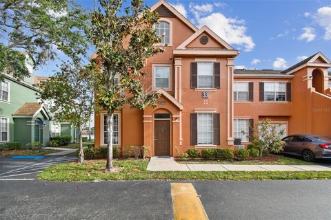 Photo of 9740 Lake Chase Island Way #9740, Tampa, FL 33626 (MLS # TB8369478)