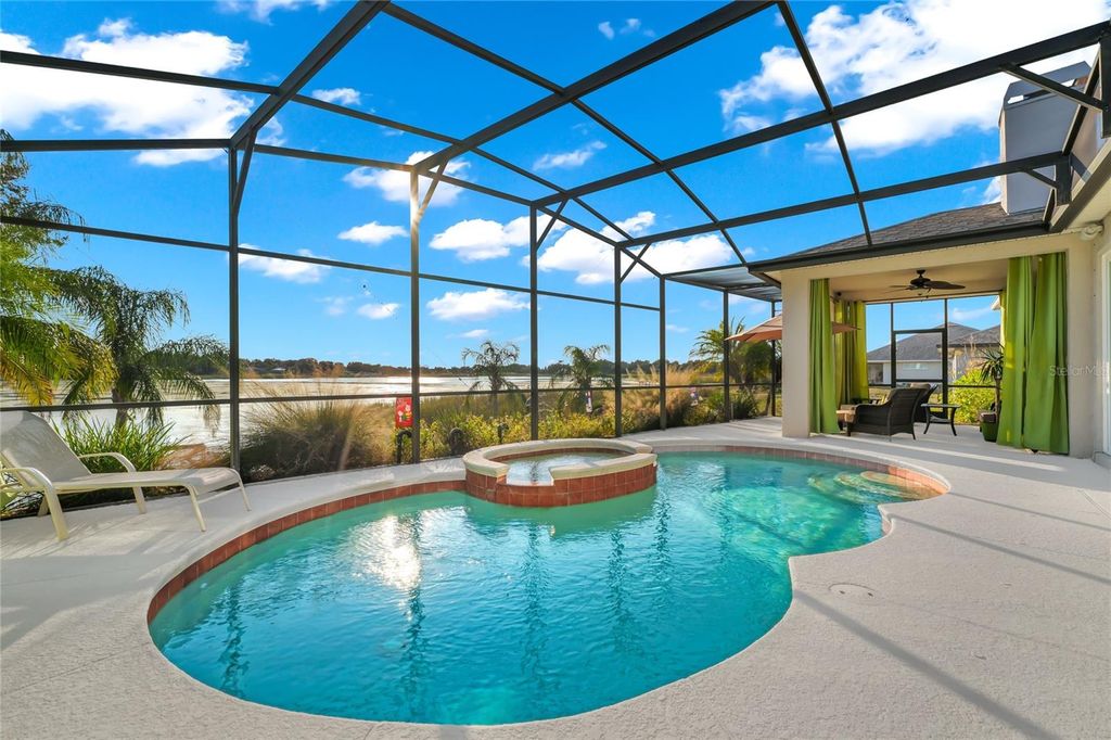 Photo of 911 Shawna Shores, Haines City, FL 33844 (MLS # O6377178)