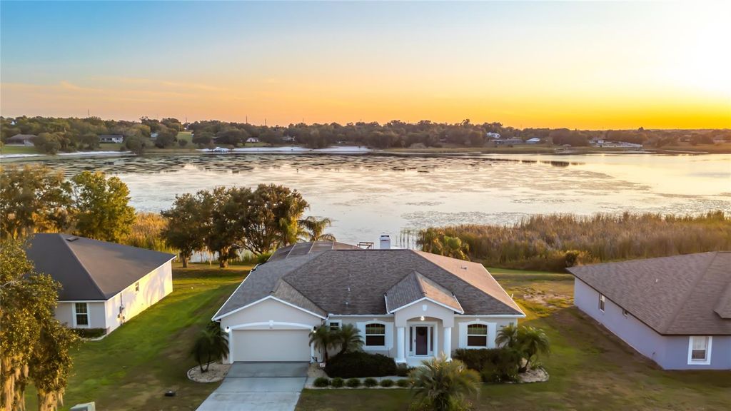 Photo of 911 Shawna Shores, Haines City, FL 33844 (MLS # O6377178)