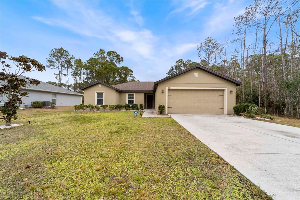 Photo of 50 Ullian Trail, Palm Coast, FL 32164 (MLS # FC316651)