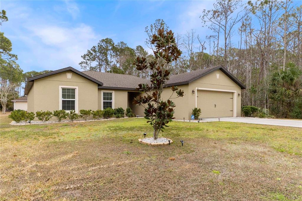 Photo of 50 Ullian Trail, Palm Coast, FL 32164 (MLS # FC316651)