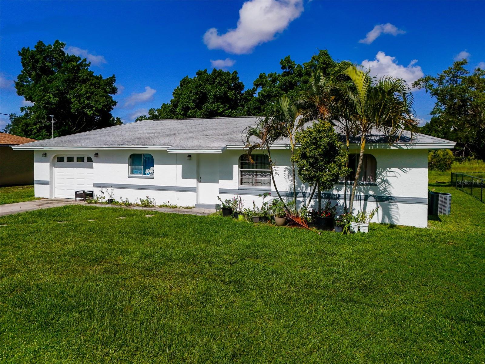 GREAT INVESTMENT OPPORTUNITY OR STARTER HOME! 3 BEDROOM, 1 BATH & 1 CAR-GARAGE HOME MINUTES TO DOWNTOWN FORT MYERS! Approximately 1,008 square feet of living area. The kitchen features wood cabinetry, laminate countertops and a window with views of backyard greenery. The living room opens up with sliding doors to the large screened lanai perfect for entertaining. Primary and two guest bedrooms share one bathroom. This home is ready for your personal touches. Located near Downtown Fort Myers, known as the River District, offering history and architecture, arts and culture, dining and entertainment, and waterfront views. Don't miss this opportunity! Schedule your private showing today!