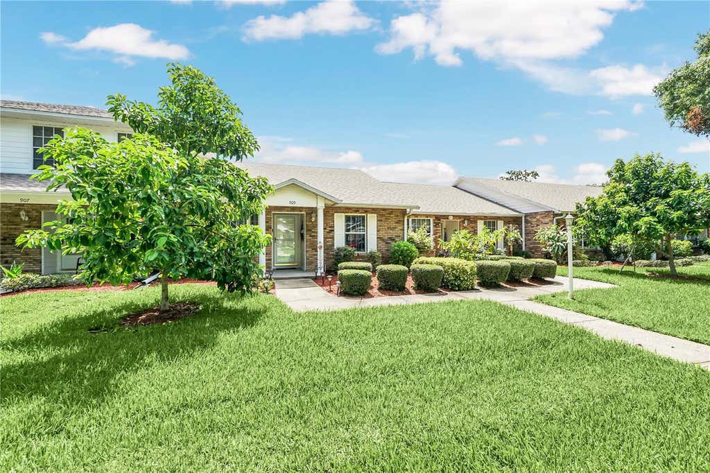 Photo of 909 Illinois Avenue, Saint Cloud, FL 34769 (MLS # O6430037)