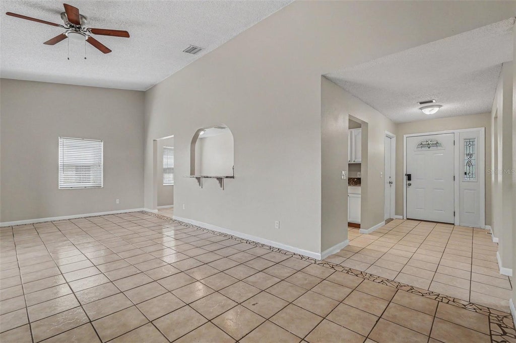Photo of 8434 Sun Drive, Port Richey, FL 34668 (MLS # O6416919)