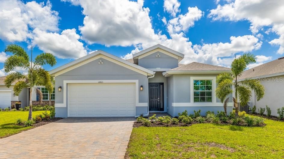 The Shelby is a one-story single-family home available at Cove at West Port in Port Charlotte, FL. This 2,221 square foot home features three bedrooms, a den, two and a half bathrooms, and a two-car garage. The Shelby floorplan features tray ceilings throughout to enhance the spacious and grand feel of this attractive home.
The exceptionally appointed kitchen includes a corner pantry and a large island that overlooks the great room and dining area. A set of three sliding glass doors lead to the expansive covered lanai. The spacious primary bedroom overlooks the backyard and includes a grand walk-in closet, dual vanity, and separate shower and garden tub. The large primary walk-in closet conveniently connects to the laundry room.
Upon entering the home, the front two bedrooms and second full bath are offset from the primary bedroom adding privacy for those rooms. A den with double French doors can be utilized as an office, gym, playroom, or living room. An oversized two-car garage allows ample space for a golf cart, bikes, workbench, or storage.
Schedule an appointment today to tour your new home.