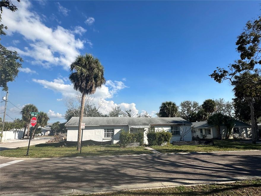 Rare redevelopment opportunity on a double-corner lot in Indian Rocks Beach, located just minutes from the Gulf beaches. Property is capable of duplex construction (buyer to verify zoning and development requirements). The existing structure sustained hurricane damage and requires substantial renovation or teardown, making this an ideal project for a builder or investor. Seller is open to partnering with a builder to design and construct a custom duplex. Zoning allows for elevated construction, and when incorporating required flood elevation and pilings, the overall structure height may approach approximately 42 feet, creating the potential for sunset views from upper-level balconies. City allows short-term rentals with a minimum 7-day rental period (buyer to verify), adding flexibility for investment or income-producing use. Excellent lot positioning near the beach in a highly desirable coastal community. Cash or construction financing recommended. Bring your vision and explore the possibilities.