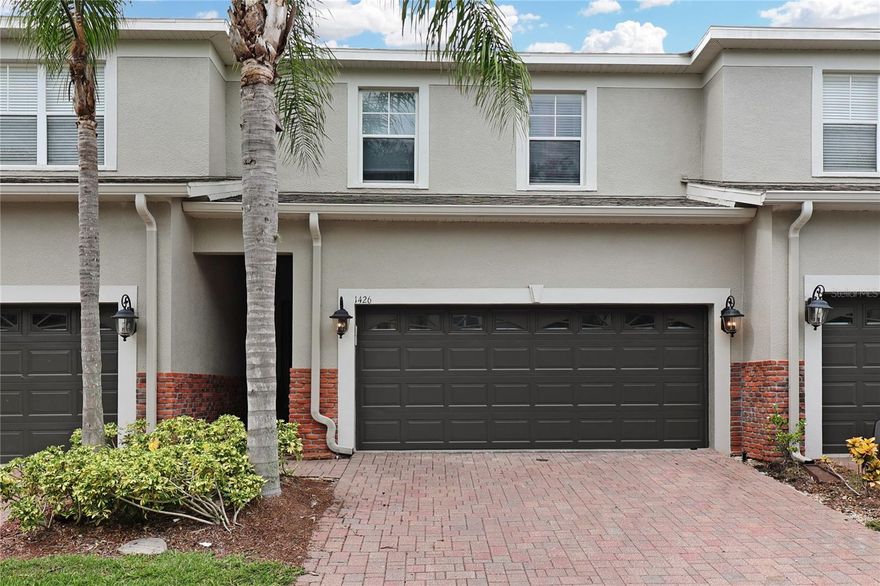 Welcome to maintenance-free living in the coveted gated community of Beckett Way Townhomes! This stunning townhome features 3 bedrooms, 2.5 baths, a spacious 2-car garage, and a generous 2,158 sq. ft. of living space, making it a true gem in the heart of Tarpon Springs. Step inside to be greeted by an expansive great room (an impressive 24'x15') that sets the stage for family gatherings and entertaining. Extend your living space to a screened balcony, perfect for sipping your morning coffee in peace. Adjacent to this is a dedicated dining area, leading you to a remarkable eat-in kitchen. This kitchen is a masterpiece, featuring elegant wood cabinetry, exquisite granite countertops, stainless steel appliances, a convenient closet pantry, a charming pass-through area, delightful hardware, and an attractive tile backsplash. Completing the first floor is a conveniently located half bath. Ascend to the second floor, and you'll find a private loft that opens up a world of possibilities for family living. It's cleverly situated to provide separation for the bedroom suites. The primary suite, generously sized at 17'x16', offers an ensuite that's sure to impress, with a garden tub, separate shower, a double bowl vanity with a marble top, and a spacious walk-in closet. The secondary bedrooms are roomy, offering ample closet space and sharing a bathroom with a full tub and shower combo. Laundry day is a breeze, with the washer and dryer conveniently located on the second floor. The Beckett Way Townhomes community, built in 2006, is well-maintained and features a welcoming community pool and a secure gated entrance. You'll also appreciate its convenient proximity to restaurants, shopping, and the beach. Don't miss this incredible opportunity to own a fantastic home in an exceptional location. Act quickly, as this won't last long!