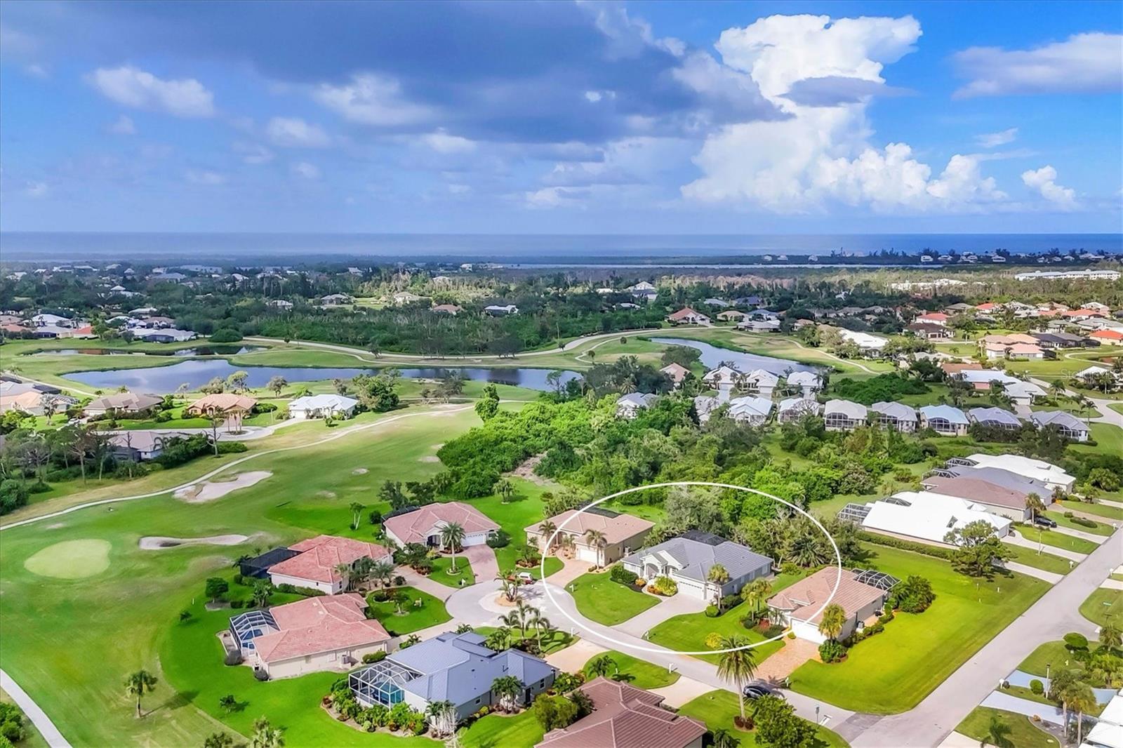 Nestled in a quiet, picturesque cul-de-sac lined with luxury homes and golf course estates, this Grand Florida residence offers timeless elegance, exceptional construction, and a lifestyle of comfort and convenience. The beautifully landscaped roundabout sets the tone for this inviting neighborhood, perfect for walking, biking, and enjoying nearby amenities. This spacious home boasts an expansive open floor plan with soaring 12-foot tray ceilings, two generous living areas ideal for entertaining, and a large kitchen with abundant cabinetry and counter space. The home features oversized guest and primary bedrooms, providing comfort and privacy for family and visitors alike. A standout feature of this property is its seamless indoor-outdoor living. Sliding doors from three separate locations open to the stunning pool lanai, creating a true extension of the interior. The covered lanai, also with 12-foot ceilings, offers ample shaded space for relaxing or dining alfresco, while mature tropical landscaping ensures privacy and tranquility. Enjoy breathtaking western sunsets each evening—your own slice of the Gulf Coast’s magic. Recent enhancements include a brand-new flat tile roof and full hurricane shutter protection, including electric motorized shutters on the lanai for peace of mind during storm season. Furnishings and decor are largely negotiable, allowing for a near turnkey opportunity. This exceptional home is just a short walk or bike ride to shopping, dining, and three full-service marinas, with easy access to historic Boca Grande, miles of pristine beaches, and a variety of public and private golf clubs. World-class boating and fishing are right at your doorstep. Don’t miss your chance to own this impressive Florida home in a coveted location that perfectly blends style, privacy, and coastal living.