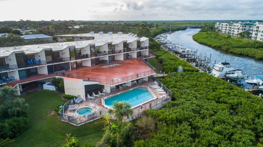 ALL BRAND NEW AND UPGRADED Marker 33 Condominium with deep water BOAT SLIP! New dock to be completed in 2023. Includes 2 bedrooms and 2 full bathrooms and Intracoastal view. This unit has some beautiful coastal furnishings included. Newly updated kitchen, bathrooms, paint & stackable washer/dryer. Granite counters throughout this 1,150 square foot condo with vaulted ceilings for that larger feel! New upgraded luxury vinyl plank throughout the entire unit. The slip is #20 and the existing lift can hold up to 12,000 Lbs. The seller has already paid a special assessment in full for the BRAND-NEW DOCK that will be installed in 2023. Do not miss out on this rare opportunity. Walking distance to lots of fine dining and coastal entertainment. The best back yard could be yours. ;LocationDescription: Condo