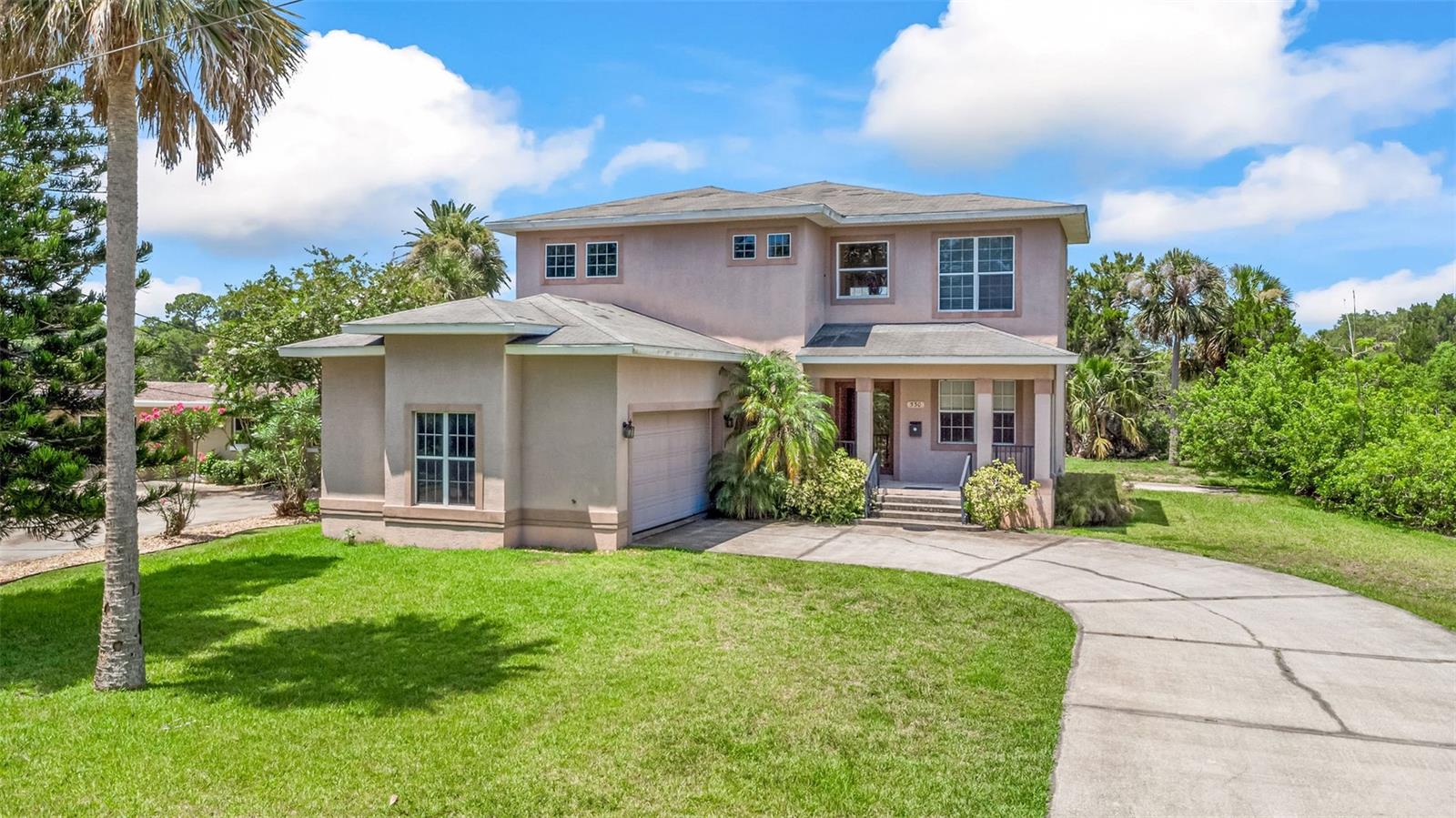 This spacious 4-bedroom, 3 1/2 bathroom Tomoka Riverfront home offers over 2,900 square feet under air and is ready for your personal touches. With water on two sides and no HOA, this unique property invites you to enjoy peaceful riverfront living without the typical price tag. The main living area features soaring 17-foot ceilings and opens to the kitchen, creating an airy, open-concept space perfect for entertaining. The master suite is conveniently located on the first floor, while three additional bedrooms, a dedicated office, and a full bath are upstairs. You’ll also find a formal dining room, inside laundry, and an additional full guest bath on the main level. A back patio and second-story balcony offer relaxing outdoor spaces, and a sitting dock provides the perfect spot to unwind by the water. Centrally located within the community and zoned for Ormond Beach schools, this home combines size, location, and waterfront living in one exceptional package.