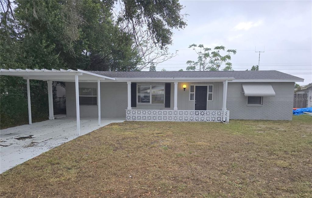 Photo of 4725 Blossom Drive, Holiday, FL 34690 (MLS # R4910352)