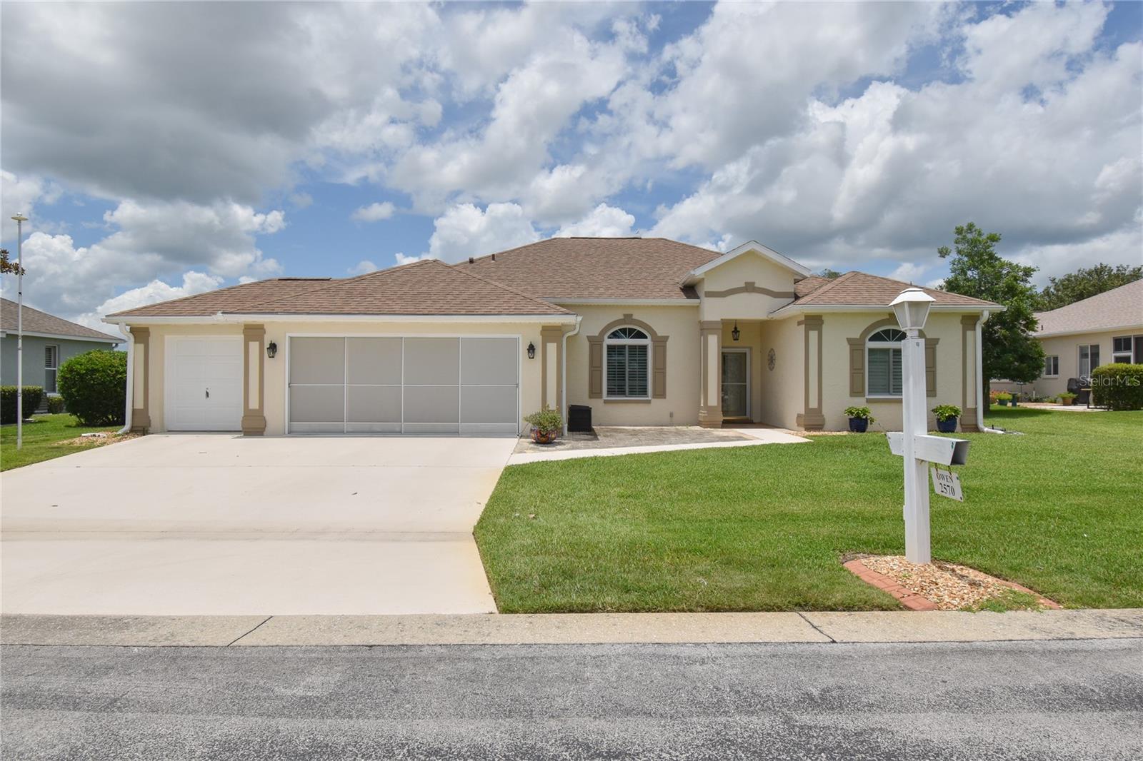 MOST DESIRBABLE MODEL IN OCALA PALMS GOLF & COUNTRY CLUB ON THE GOLF COURSE WITH A GOLF CART GARAGE! New Roof (8-2025) A/C (6-2022) This 2Bd+Den/2Ba house has been totally upgraded and is in move-in condition. There is brick tiled entrance for your lawn furniture to the left that leads to the new lead-glass front door and the open living room with a great view of the Florida Room and back yard. The living room has room for a large, screen television and is perfect for entertaining. The kitchen and dining rooms are also open for easy conversations. The kitchen has clear top range, refrigerator, time-saving dishwasher and built-in microwave. The kitchen has a large pantry for storing your groceries and various appliances. The kitchen has ample counterspace for baking cookies. The dining room has bay windows for enjoying the view of the backyard and the golf course. The Master bedroom has two separate closets; one is a walk-in, and the other closet is built-in with plenty of storage. The Master bathroom has recently been remodeled with a new walk-in shower, double sink vanity with new faucets and new lighting fixtures. The guest bedroom has a built-in closet and has a view of the front lawn. The guest bathroom has also been remodeled with a new sink, faucet and fixture which improves the look of the bathroom. The Florida room is under heat and air for your year-round comfort and has glass windows for easy cleaning. There is a golf cart garage for storing your golf cart or for extra storage. Seller is leaving the golf cart for the new buyers as a gift! For more details on golf please visit: https://ocalapalmsgolf.com. View Community Amenities at: https://www.ocalapalmsresidents.com. All measurements are approximate. GREAT LOCATION: Close to Shopping across the Street at Publix, Walgreens Various Banks, Restaurants, Liquor Store, Gold's Gym, etc. 1 1/2 miles East of the World Equestrian Center. 1 1/2 Hours from Orlando and all the Attractions including Disney World, Universal Studios, Legoland, Sea World, Epcot, the Airport, etc. 1 1/2 Hours from Both Coasts. All measurements are approximate. Buyer(s) to re-measure. Ocala Palms offers a pristine golf course, indoor and outdoor pools, and fitness center. Embrace the vibrant lifestyle that Ocala Palms has to offer in this exceptional home.