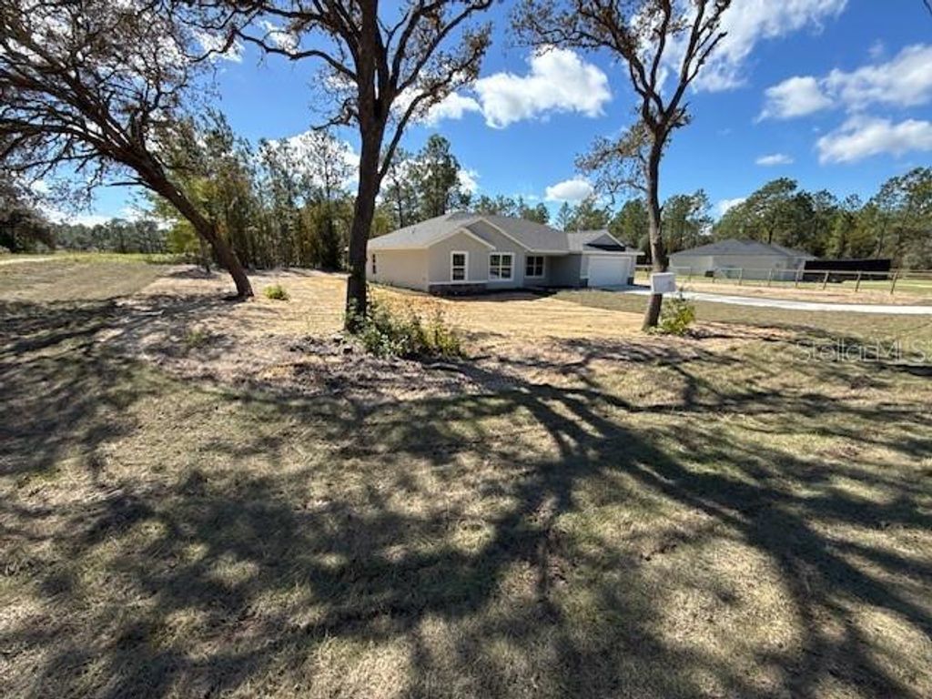 Photo of 12728 SW 80th Street, Dunnellon, FL 34432 (MLS # OM712456)