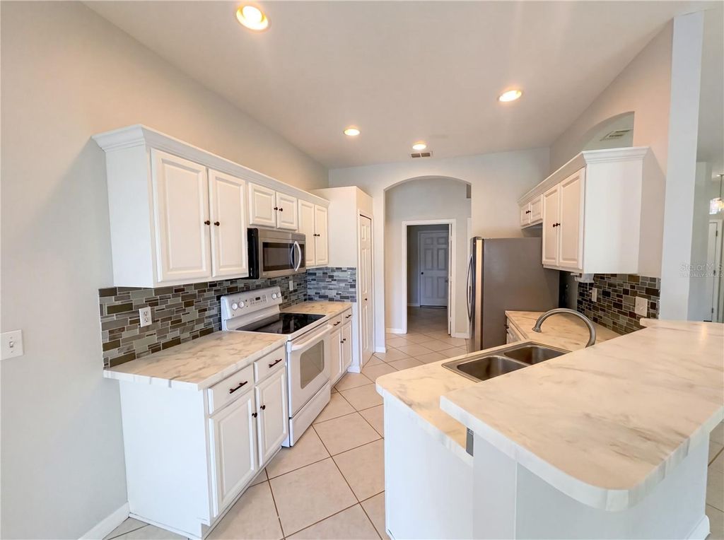 Photo of 6457 Myrtlewood Drive, Lakeland, FL 33810 (MLS # O6400197)