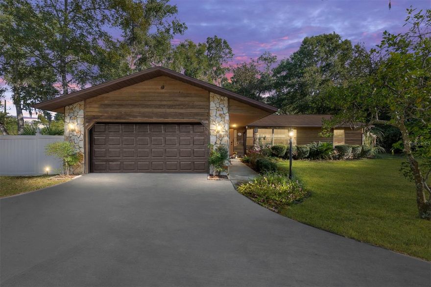 The only owners of this custom built home have raised their family here and are ready for you to cherish it as much as they have.  Over the years, they have made thoughtful updates and maintained every detail with pride and care, creating a home that’s both inviting and well-appointed. This is not a "cookie-cutter" home and once you step inside you will appreciate its character, beginning with its exterior cedar siding. NO HOA, corner lot with a easy access circular drive, and a vinyl fence are just a few perks.  The highlight of this home is the beautiful cedar screened-in lanai, crafted with care and designed for peaceful mornings, cozy evenings, and effortless entertaining.  The gorgeous A-frame cedar ceiling allows the natural light to abound and includes smart lighting and a ceiling fan. This home features lovely wood plank tile flooring throughout — durable, water resistant, kid-proof, and pet-proof, with no carpet anywhere. The living room is bright and welcoming with bay windows that fill the space with natural light, and a charming wood beam accenting the ceiling adds warmth and character.  Your kitchen has granite countertops, a breakfast bar, and includes a tv to play music or watch your cooking shows. The convenient single basin sink for washing those big pans also includes an instant hot water heater and reverse osmosis system.  And this pantry is a space saver! It has a full size 4 shelf Lazy Susan to hold all of those pantry items.  It is a split plan, with the primary bedroom featuring a walk-in closet and updated bathroom with granite. The guest bedrooms have spacious closets also. And the guest bathroom has also been updated and have granite.
  An inside laundry area has office space, and a private covered patio. The spacious 2 car garage has a workbench, existing shelving, and a skylight to help with energy efficiency and visibility.  So much detail has been put into making this a home, including a generator hook up, gutters, irrigation system, Wi-Fi thermostat and garage opener and porch lights. The mature shade trees provide isolation and yet plenty of sunlight. County zoning. Roof 2015, garage door 2024,  new well drilled 2025.