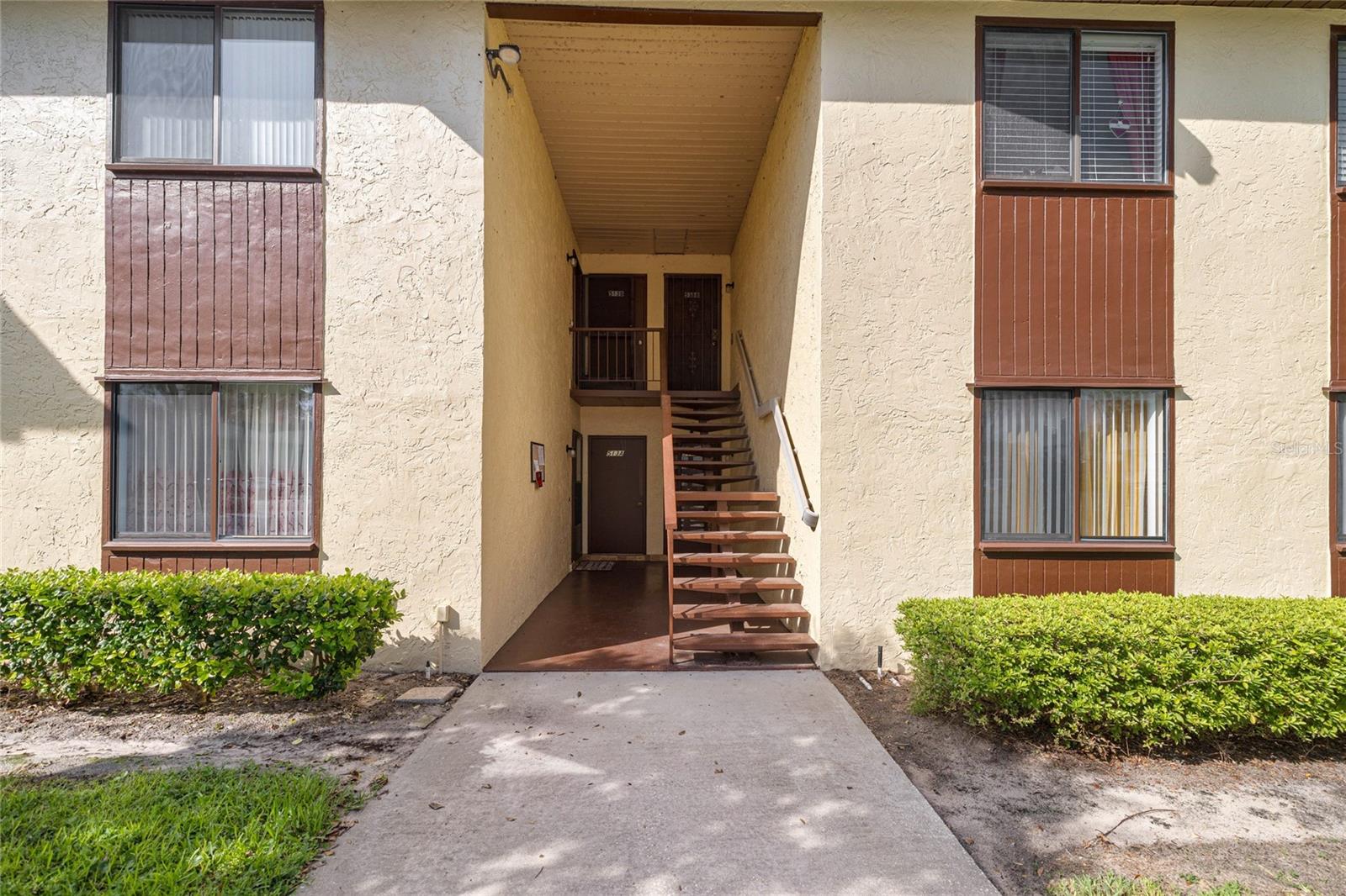 Welcome to this beautifully updated and meticulously maintained 2-bedroom, 2-bath condo located in the desirable Fairways No. 7, a peaceful 55+ community just minutes from shopping, dining, and recreation.
This unit features luxury vinyl plank flooring throughout, fresh paint, and updated bathrooms. The standout feature is the enclosed Florida room (under air, 207 sq. ft.), offering serene views of the community pool and recreation area—perfect for enjoying your morning coffee or evening relaxation.
The kitchen offers ample cabinet space, a large pantry, and custom shelving throughout for additional storage. Both bedrooms are generously sized and include walk-in closets, with extra closets located throughout the home. The oversized laundry room is unique to these units, with space for a full-sized washer and dryer.
Additional upgrades include a 2020 HVAC system, 2018 electric panel, and 2023 washer and dryer. This home is move-in ready and designed for low-maintenance, easy living.
The HOA covers building and common area maintenance, basic cable, trash, lawn care, and use of the community pool. Located near Silver Springs Shores Golf & Country Club with an Optional membership to Silver Springs Shores Community Center ($5/year) with access to 3 pools, fitness center, pickleball, basketball, volleyball, and a full calendar of events. Less than 2 miles to Walmart, grocery stores, and restaurants. Surrounded by beautiful walking trails and abundant Florida wildlife. Pet-friendly and perfect for seasonal or year-round living.
Don’t miss this opportunity to own a low-maintenance, updated home in a vibrant and welcoming 55+ community. Schedule your private showing today! Some photos have been virtually staged.