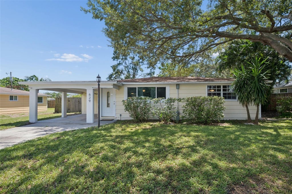 Photo of 629 Lexington Street, Dunedin, FL 34698 (MLS # TB8547174)