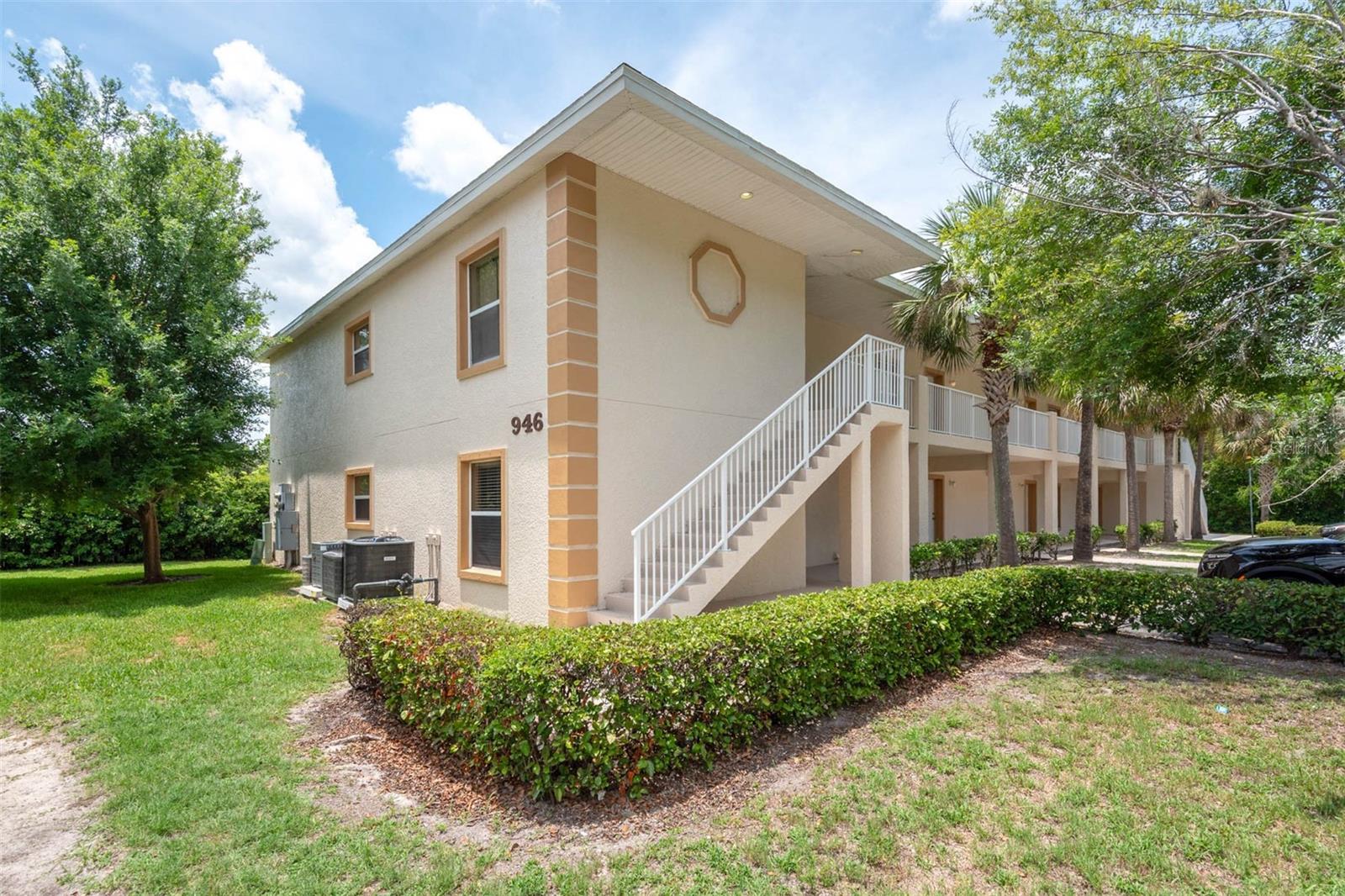 Welcome to this beautifully maintained 2-bedroom, 2-bath condo offering 1,010 sq ft of comfortable living in Holly Hill. This second-floor unit features a modern kitchen with granite countertops, stainless steel appliances, and ample cabinetry, flowing into a bright and open living and dining area. Both bedrooms are spacious with generous closet space, and the unit includes in-unit laundry, a private balcony, assigned carport parking, and an exterior storage closet. Conveniently located just minutes from Daytona and Ormond Beaches, shopping, parks, and nearby colleges like Daytona State, Embry-Riddle, and Bethune-Cookman. Move-in ready and ideal as a primary residence or investment opportunity.