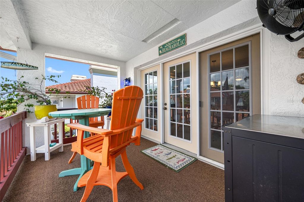 Photo of 10600 Village Drive #201, Seminole, FL 33772 (MLS # TB8414676)