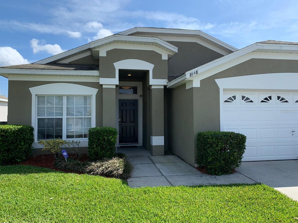 Photo of 8148 Sun Palm Drive, Kissimmee, FL 34747 (MLS # O6443052)