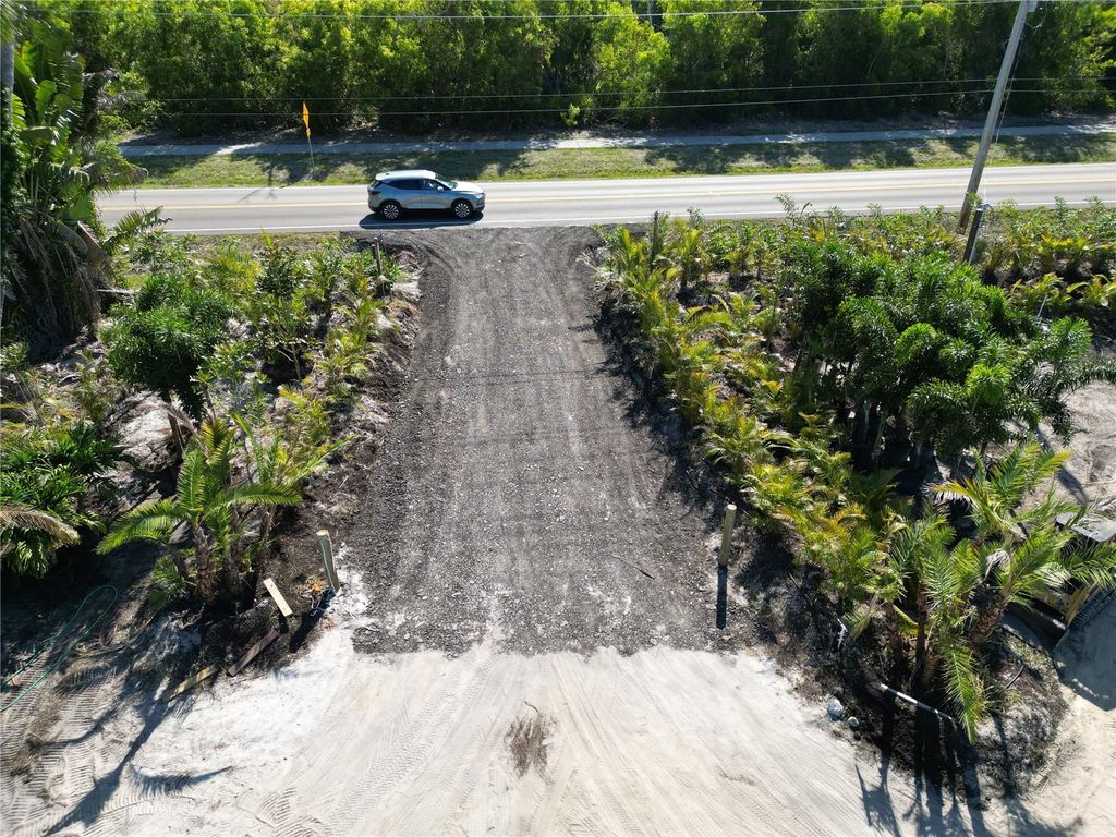 Photo of 11851 Stringfellow Road, Bokeelia, FL 33922 (MLS # A4692297)