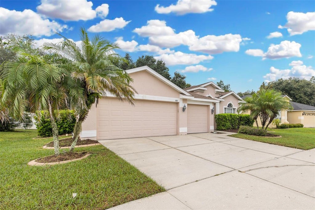 Photo of 5815 Justicia Loop, Land O Lakes, FL 34639 (MLS # TB8555954)