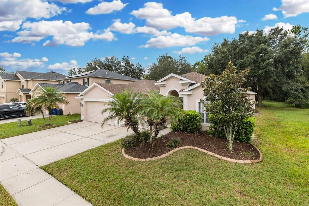 Photo of 5815 Justicia Loop, Land O Lakes, FL 34639 (MLS # TB8555954)