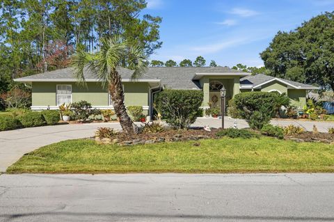 Photo of 33 Poinsettia Lane, Palm Coast, FL 32164 (MLS # FC314337)