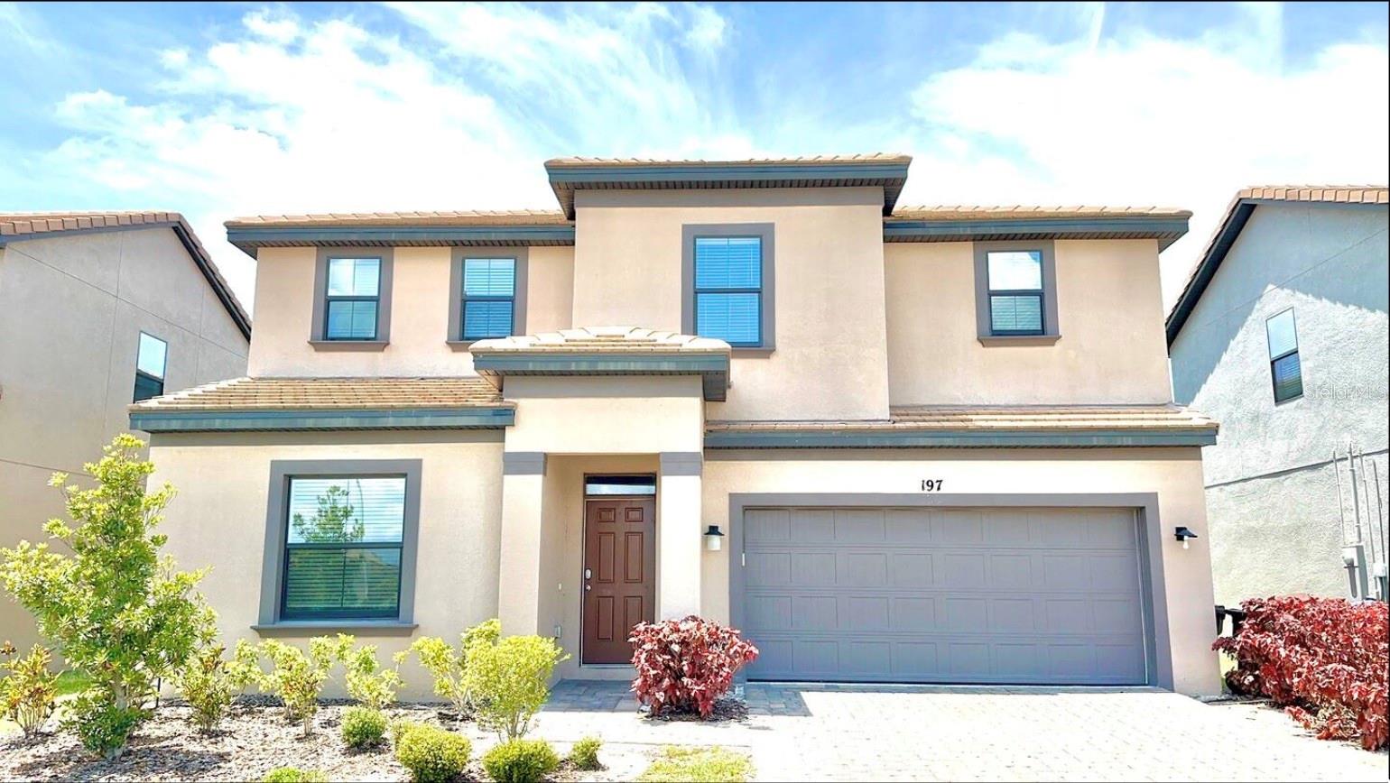 Take a look this 6beds and 7bathrooms gorgeous lake view Luxury home and or Vacations or benefit from hassle free rental income property. This home features a great room concept with modern design and decorations. Each room has own bathroom. Private pool with heater. The kitchen is well equipped with stainless appliances, solid surfaces with under mount sink, full tile backsplash and breakfast bar. The dining & living room are at the center with a large sliding door that opens to your large private screened in pool with splash pad and surrounded by outdoor living space. This home is surrounded by beautifully designed landscaping within 113 acre gated community. The luxury Resort of Balmoral at Waters Edge is located off US27 approximately 30 minutes to the Disney theme parks and only 15 minutes to Lego Land. This gated community will create wonderful memories for you and your family with your very own water park on site which includes Cabanas, Spa, Board Walk, Sand bar, large patio and outdoor Bar and Grille. There is also a Games Room, Business and Fitness centers. Please schedule your showing today!