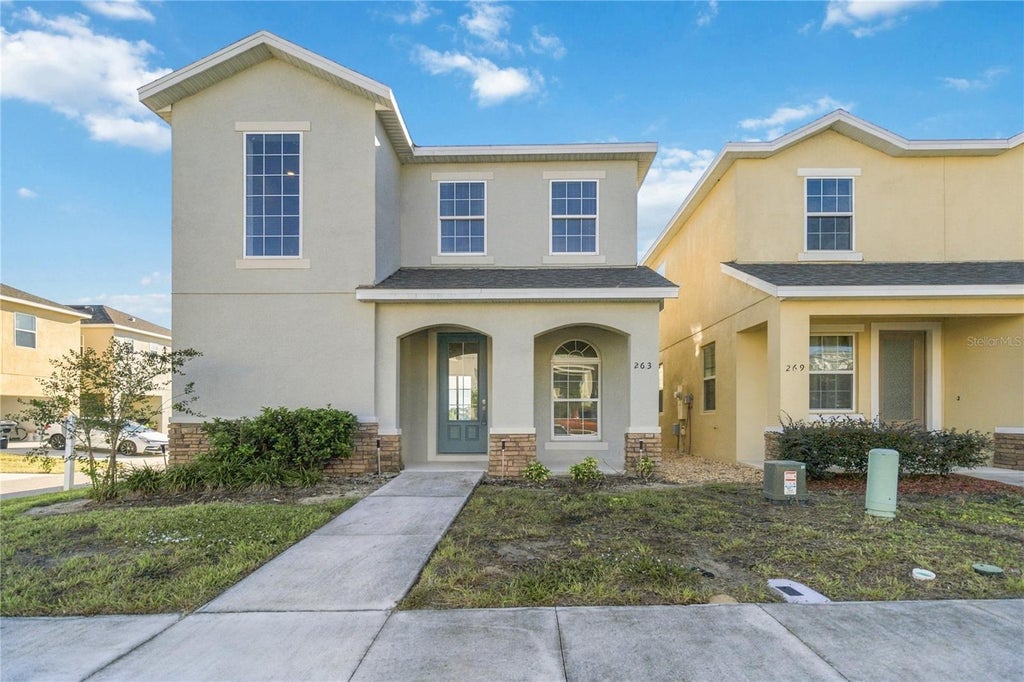 Photo of 263 Bella Prestwick Blvd, Davenport, FL 33837 (MLS # S5158851)