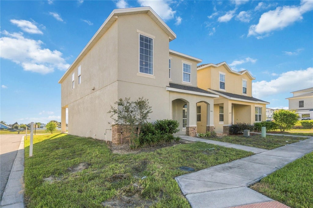 Photo of 263 Bella Prestwick Blvd, Davenport, FL 33837 (MLS # S5158851)