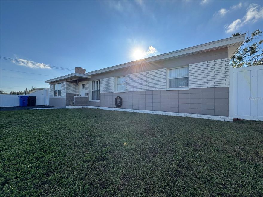 Seller Never Occupied Property. Come scoop up this ready to go 3bed 2 bath home that needs a few updates to be the perfect sized right home. Fully fenced HUGE backyard with white vinyl panels. Plenty of room for a BBQ if you repair the outdoor cooking pit, big enough for a block party!  Interior Fireplace, located near could be? “pool” bath/utility room. Galley kitchen that is ready and waiting for that easy facelift. 3 bedrooms each with closets and shared bathroom round out this right sized home.  Close to DaleMabry for excellent North/South Travel.  Close to Raymond James.  Close to the POSSIBLE?? New Tampa Bay Rays stadium project at the HCC campus possibly?  Jump over to St Pete or Downtown Tampa 15 mins.  Easy access to Tampa International Airport!   Everything you would ever need all in 15 mins from this homesite.  Sports/Hospital/Shopping/Travel all without breaking the bank.