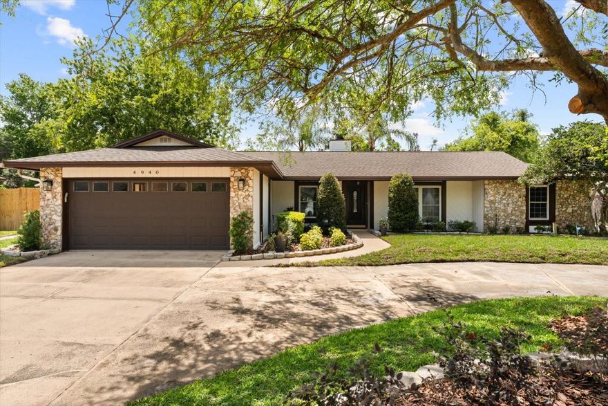 One or more photo(s) has been virtually staged. This newly renovated, move-in ready Dr. Phillips home is waiting for you to call it home! The house has new roof (2025), new A/C (2026), new kitchen featuring SOLID WOOD SOFT CLOSE CABINETS/DRAWERS and QUARTZ COUNTERTOPS with WATERFALL BREAKFAST BAR(2025), new primary bathroom vanity/toilet (2026), new tub in 2nd bathroom (2025), new ENGINEERED HARDWOOD FLOORING in ALL BEDROOMS (2026), newer marble top vanity in 2nd bathroom, and brand new landscaping. Freshly painted inside and out, including the garage. Enjoy relaxing on the enclosed lanai which opens up to the spacious backyard that has plenty of room to build a pool and spa. Curl up with a good book and a cup of coffee on the cushioned bay window seats in the family room. Entertain guests in the light and bright living and dining rooms, with vaulted ceiling and elegant chandelier hanging from wood beam on the ceiling. The bonus room can be a home office, hobby room or guest bedroom. Located in Dr. Phillips, close to Universal Studios, restaurant row dining, shopping centers, and A-rated schools.