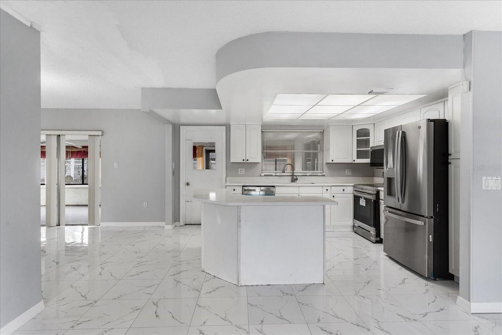 Photo of 8609 Sunny Hollow Lane, Orlando, FL 32819 (MLS # O6366254)