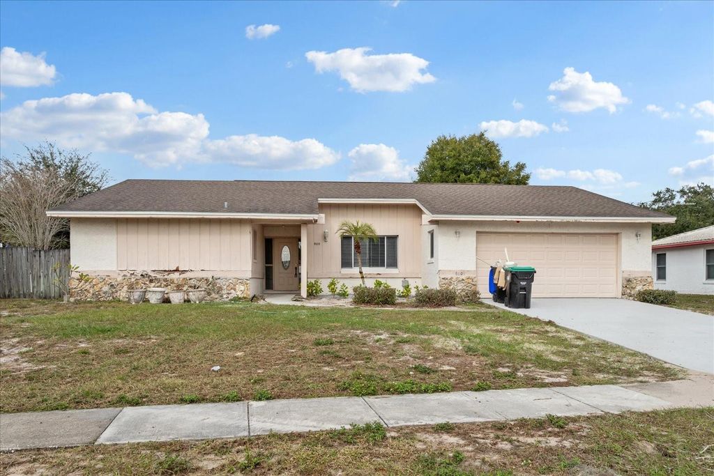 Photo of 8609 Sunny Hollow Lane, Orlando, FL 32819 (MLS # O6366254)
