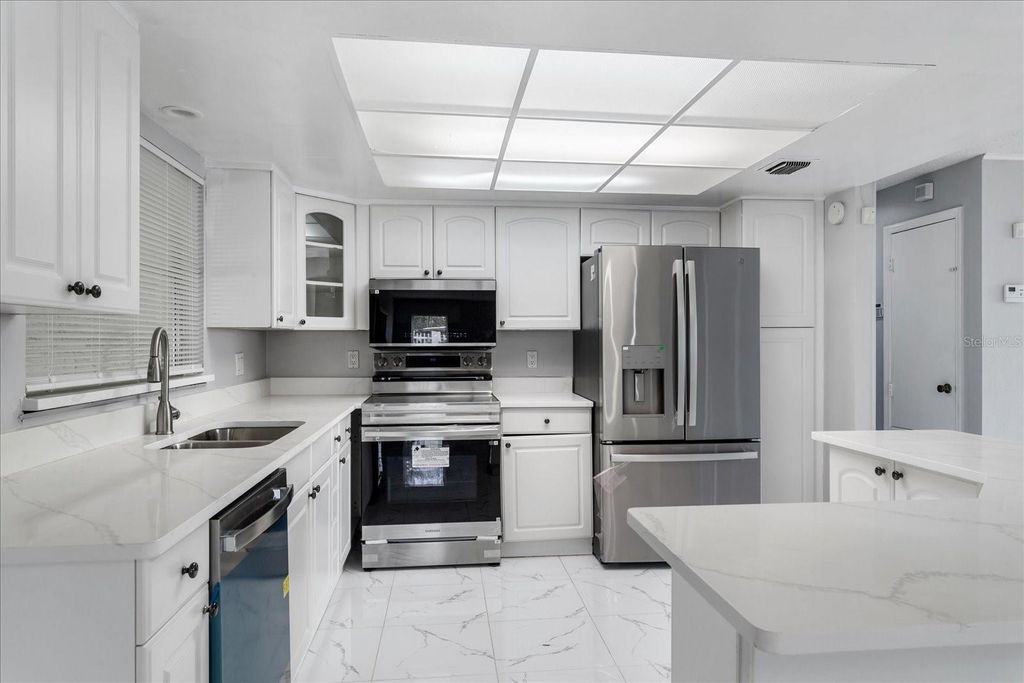 Photo of 8609 Sunny Hollow Lane, Orlando, FL 32819 (MLS # O6366254)