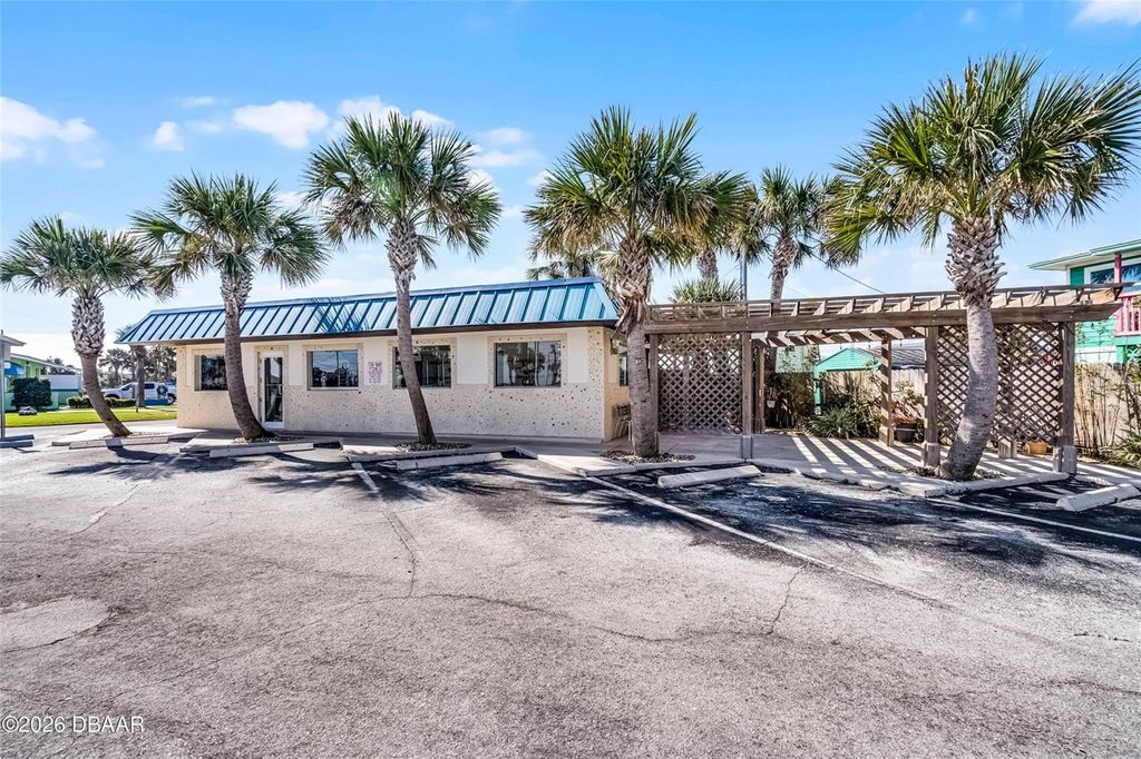 Photo of 819 Sr A1a Highway, New Smyrna Beach, FL 32169 (MLS # NS1087939)
